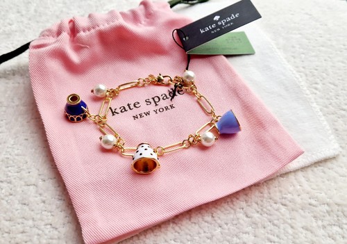 Kate spade tea - kate, charms